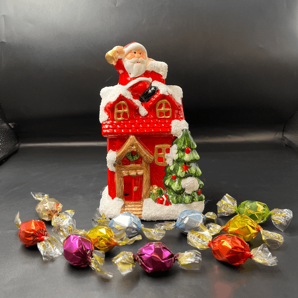 Twist Çikolata & Işıklı Çatıda Oturan Noel Baba Biblo